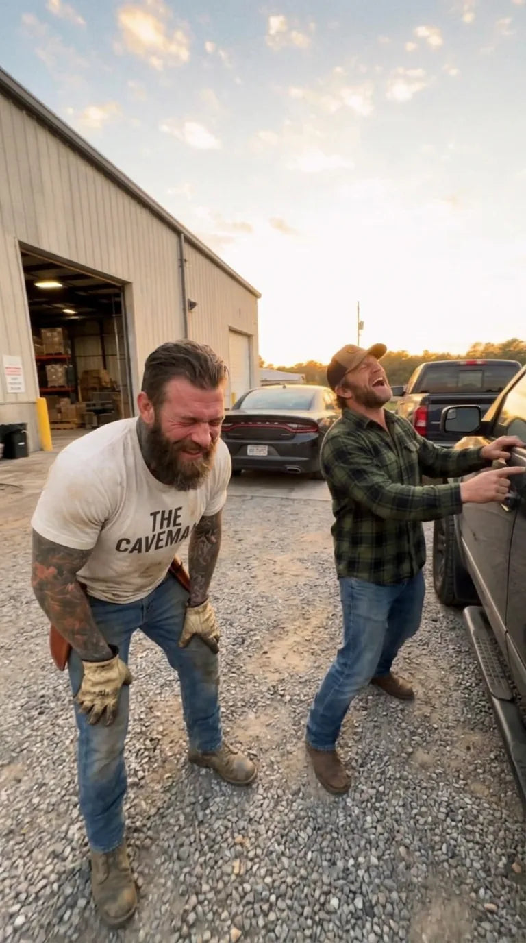 Mike and Ben crying laughing in the warehouse lot